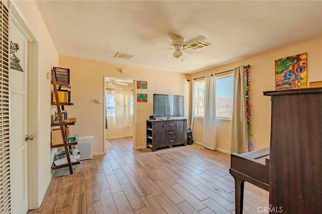 9668 W Rosamond Blvd, Rosamond, CA 93560 - bedroom featuring wood finished floors and a ceiling fan