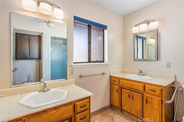 1835 Hilltop Dr, Colton, CA 92324 - full bath featuring two vanities, a shower, and tile patterned floors