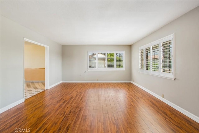 1835 Hilltop Dr, Colton, CA 92324 - empty room featuring hardwood / wood-style floors and baseboards