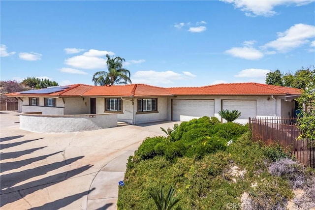 1835 Hilltop Dr, Colton, CA 92324 - ranch-style home featuring an attached garage, stucco siding, and a tiled roof