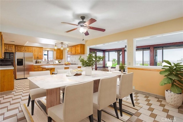 1835 Hilltop Dr, Colton, CA 92324 - dining area featuring light flooring and ceiling fan