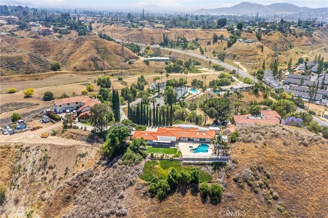 1835 Hilltop Dr, Colton, CA 92324 - aerial view of property's location with a mountainous background