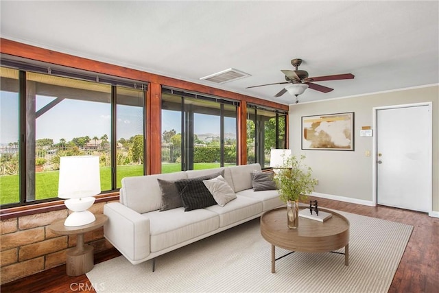 1835 Hilltop Dr, Colton, CA 92324 - living area featuring plenty of natural light, a ceiling fan, wood finished floors, and ornamental molding