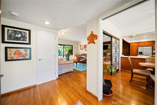 416 N Westridge Ave, Glendora, CA 91741 - corridor featuring light wood-style floors, recessed lighting, and crown molding
