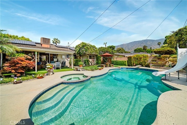 416 N Westridge Ave, Glendora, CA 91741 - view of swimming pool featuring an in-ground hot tub, a patio, a water slide, a mountain view, and a fenced backyard