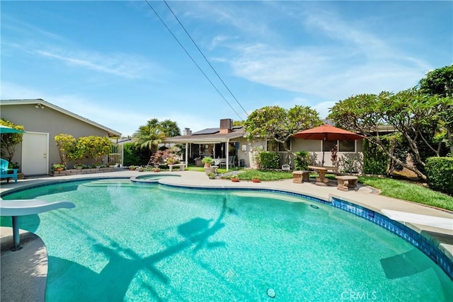 416 N Westridge Ave, Glendora, CA 91741 - swimming pool with a water slide, a diving board, and a patio area