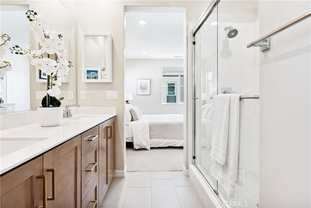 780 Stirrup, Rancho Mission Viejo, CA 92694 - full bathroom with connected bathroom, a shower stall, double vanity, tile patterned flooring, and recessed lighting