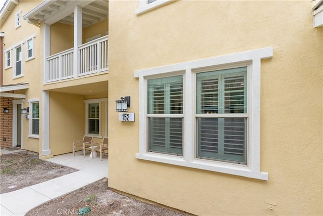 152 Jaripol Cir, Rancho Mission Viejo, CA 92694 - view of exterior entry featuring stucco siding