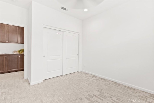 152 Jaripol Cir, Rancho Mission Viejo, CA 92694 - unfurnished bedroom with a closet, light carpet, and recessed lighting