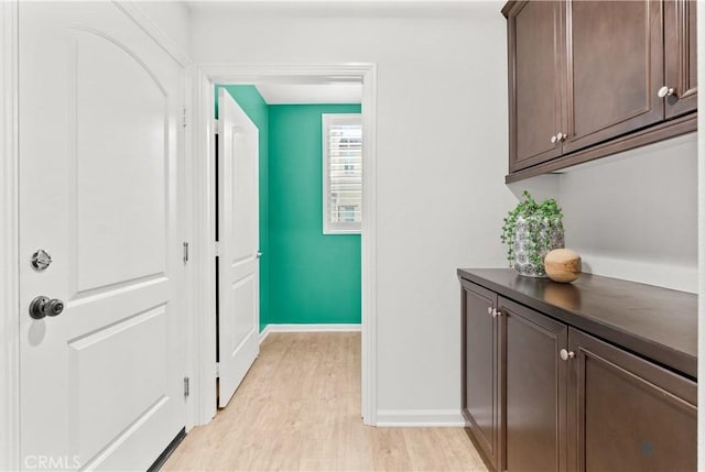 152 Jaripol Cir, Rancho Mission Viejo, CA 92694 - corridor with light wood-style flooring and baseboards
