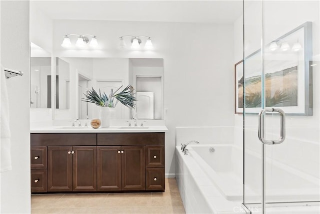 152 Jaripol Cir, Rancho Mission Viejo, CA 92694 - full bathroom featuring double vanity, a garden tub, tile patterned floors, and a stall shower
