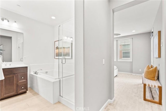 152 Jaripol Cir, Rancho Mission Viejo, CA 92694 - bathroom with vanity, a bath, a stall shower, and recessed lighting