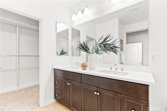152 Jaripol Cir, Rancho Mission Viejo, CA 92694 - full bathroom with double vanity and tile patterned floors