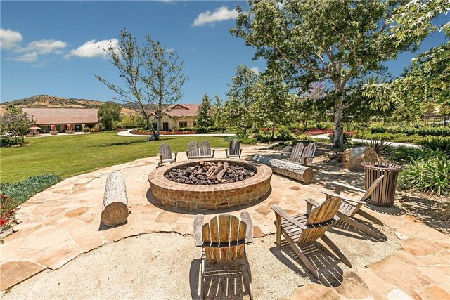 152 Jaripol Cir, Rancho Mission Viejo, CA 92694 - view of patio with an outdoor fire pit