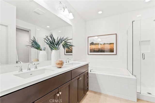 152 Jaripol Cir, Rancho Mission Viejo, CA 92694 - full bathroom with a garden tub, a shower stall, double vanity, tile patterned floors, and recessed lighting