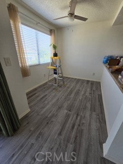 9633 Juniper Ave Unit F2, Fontana, CA 92335 - unfurnished room featuring a textured ceiling, a ceiling fan, and wood finished floors