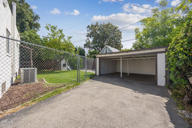 1430 Pepper Dr, Pasadena, CA 91104 - garage featuring a detached carport and asphalt driveway