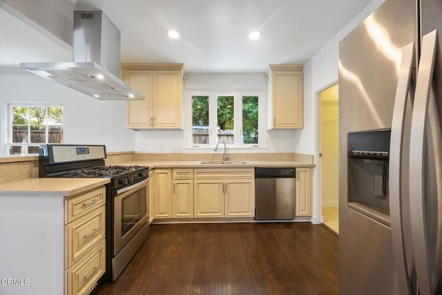 1430 Pepper Dr, Pasadena, CA 91104 - kitchen featuring appliances with stainless steel finishes, island range hood, cream cabinetry, a peninsula, and light countertops