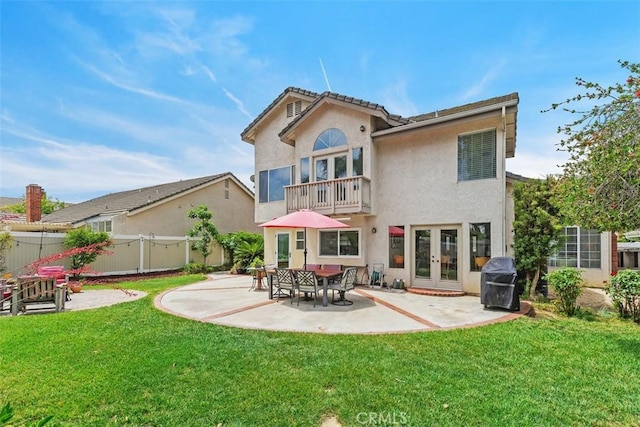 45620 Hopactong St, Temecula, CA 92592 - back of house featuring french doors, a balcony, stucco siding, and a patio area