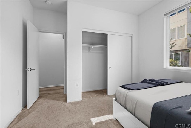 5265 Beachfront Cove St Unit 167, San Diego, CA 92154 - carpeted bedroom with a closet and baseboards