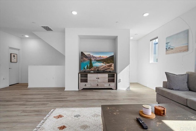 5265 Beachfront Cove St Unit 167, San Diego, CA 92154 - living room featuring recessed lighting and wood finished floors