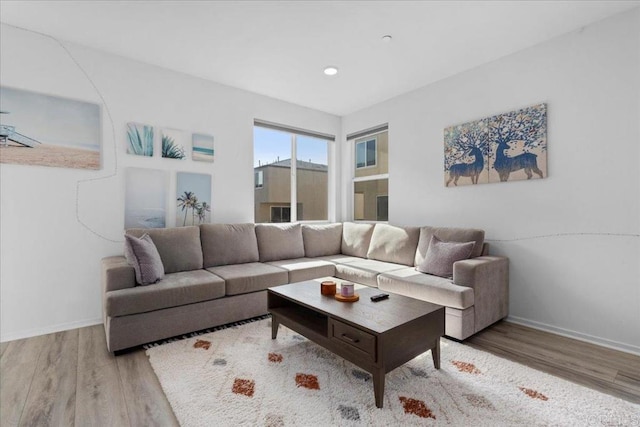 5265 Beachfront Cove St Unit 167, San Diego, CA 92154 - living room featuring wood finished floors and recessed lighting