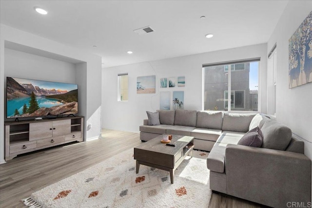 5265 Beachfront Cove St Unit 167, San Diego, CA 92154 - living area with wood finished floors and recessed lighting