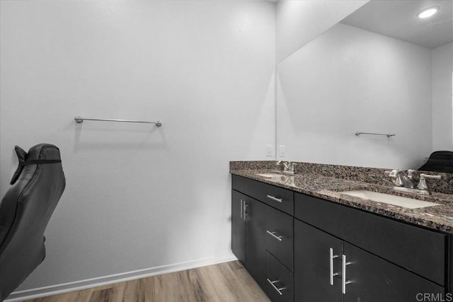 5265 Beachfront Cove St Unit 167, San Diego, CA 92154 - full bath featuring wood finished floors and double vanity