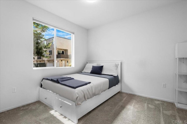 5265 Beachfront Cove St Unit 167, San Diego, CA 92154 - carpeted bedroom featuring baseboards