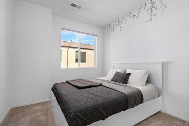 5265 Beachfront Cove St Unit 167, San Diego, CA 92154 - bedroom featuring light colored carpet and baseboards