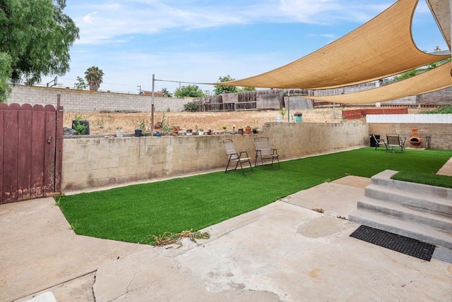 2842 E 18th St, National City, CA 91950 - fenced backyard featuring a patio area