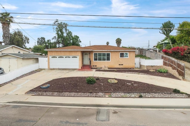 2842 E 18th St, National City, CA 91950 - view of front facade featuring an attached garage, concrete driveway, and stucco siding