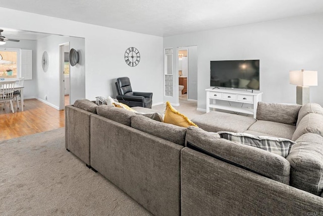 2842 E 18th St, National City, CA 91950 - living area featuring ceiling fan, carpet flooring, and wood finished floors