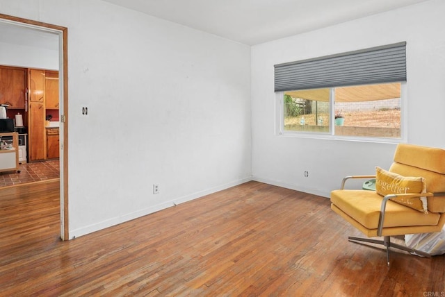 2842 E 18th St, National City, CA 91950 - living area with wood finished floors and baseboards