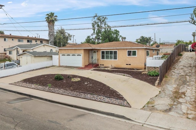 2842 E 18th St, National City, CA 91950 - ranch-style home featuring stucco siding, driveway, and an attached garage