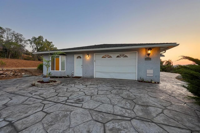 2814 Helix St, Spring Valley, CA 91977 - view of front of property featuring concrete driveway, a garage, and stucco siding