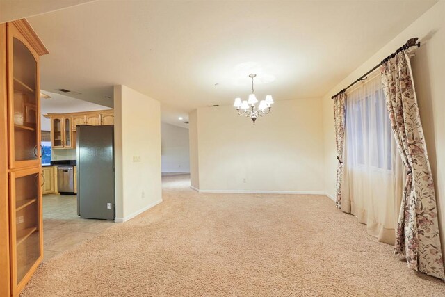 2814 Helix St, Spring Valley, CA 91977 - unfurnished room with a chandelier and light carpet