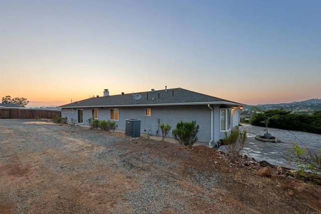2814 Helix St, Spring Valley, CA 91977 - rear view of house featuring stucco siding and a chimney