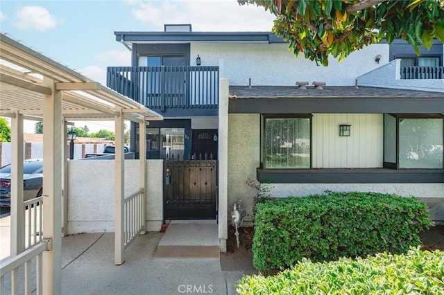 20821 E Calora St Unit E1, Covina, CA 91724 - entrance to property featuring a balcony and stucco siding
