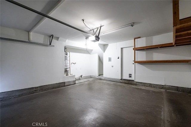 20821 E Calora St Unit E1, Covina, CA 91724 - garage with a garage door opener and secured water heater
