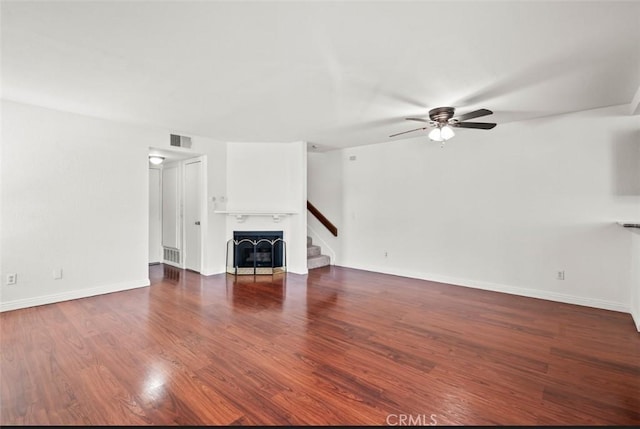 20821 E Calora St Unit E1, Covina, CA 91724 - unfurnished living room with ceiling fan, wood finished floors, and stairway