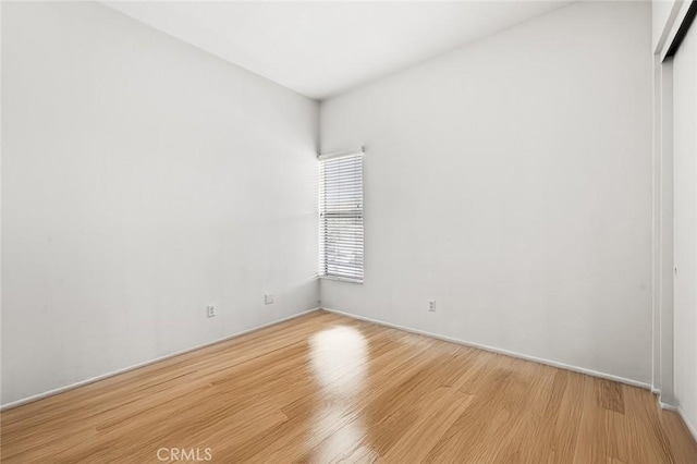 20821 E Calora St Unit E1, Covina, CA 91724 - spare room featuring light wood-style floors and baseboards