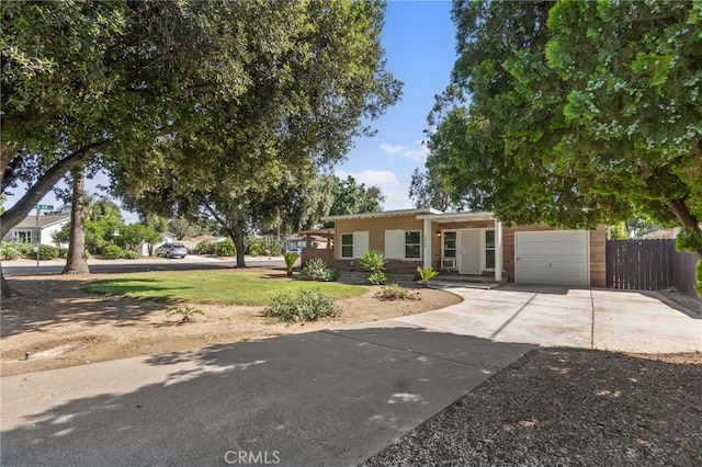 3604 Cortez St, Riverside, CA 92504 - ranch-style house featuring a garage and concrete driveway