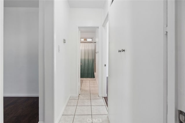 3604 Cortez St, Riverside, CA 92504 - hallway featuring light tile patterned floors and baseboards