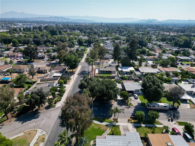 3604 Cortez St, Riverside, CA 92504 - aerial overview of property's location featuring a mountain backdrop and nearby suburban area