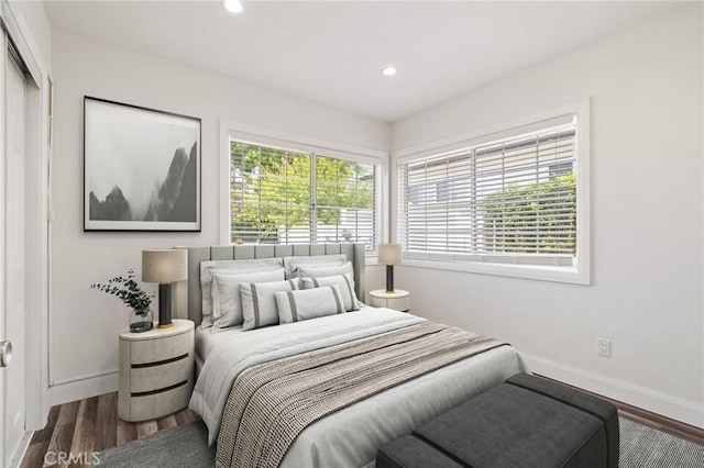 11440 Gothic Ave, Granada Hills, CA 91344 - bedroom featuring multiple windows, recessed lighting, and wood finished floors