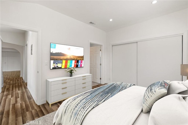 11440 Gothic Ave, Granada Hills, CA 91344 - bedroom featuring wood finished floors, recessed lighting, arched walkways, and a closet