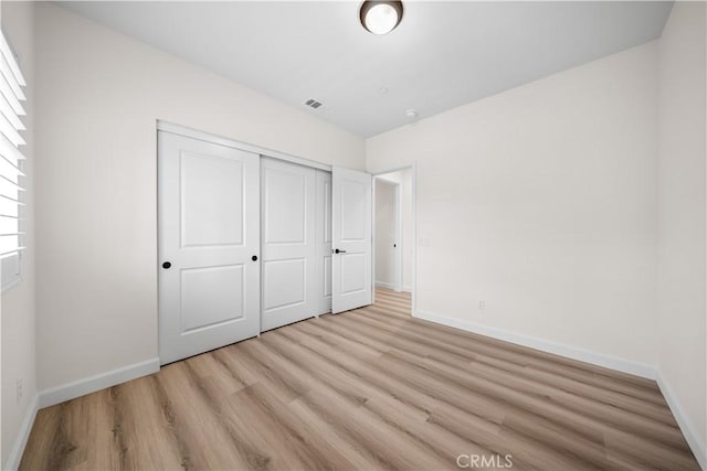 1379 Point Loma Pl, Walnut, CA 91789 - unfurnished bedroom featuring light wood-style floors and a closet