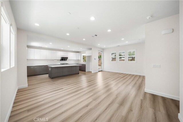 1379 Point Loma Pl, Walnut, CA 91789 - living room with light wood-style flooring and recessed lighting