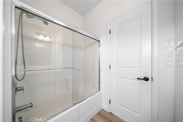 1379 Point Loma Pl, Walnut, CA 91789 - bathroom featuring combined bath / shower with glass door and wood finished floors